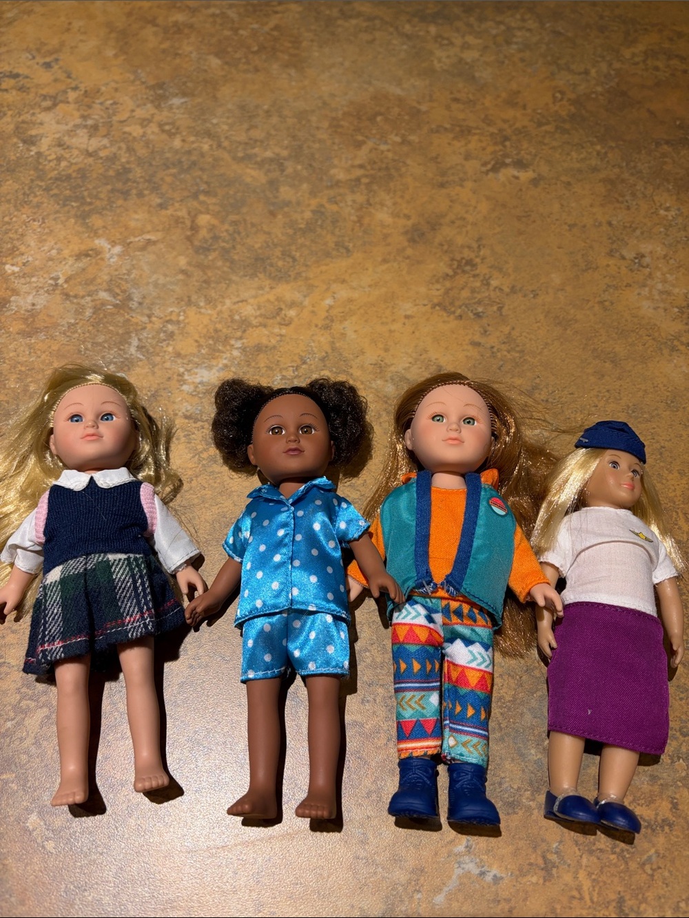 Lot of 4 Dolls